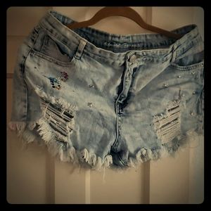 Fringe cut off shorts